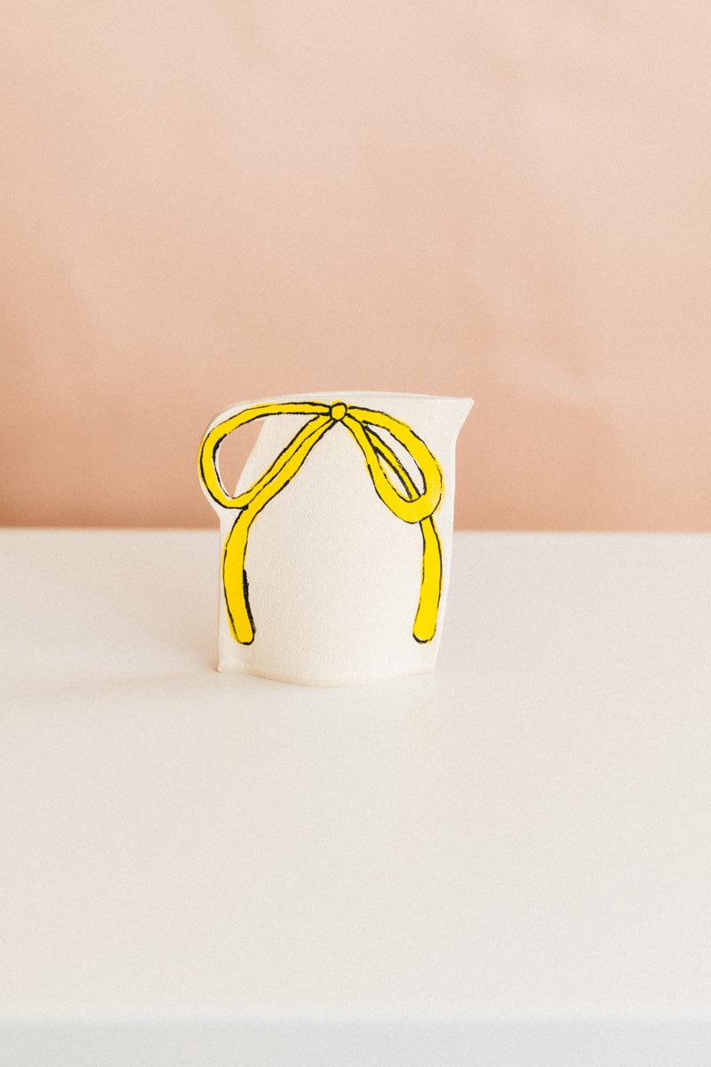 VASE WITH YELLOW AND PINK BOW