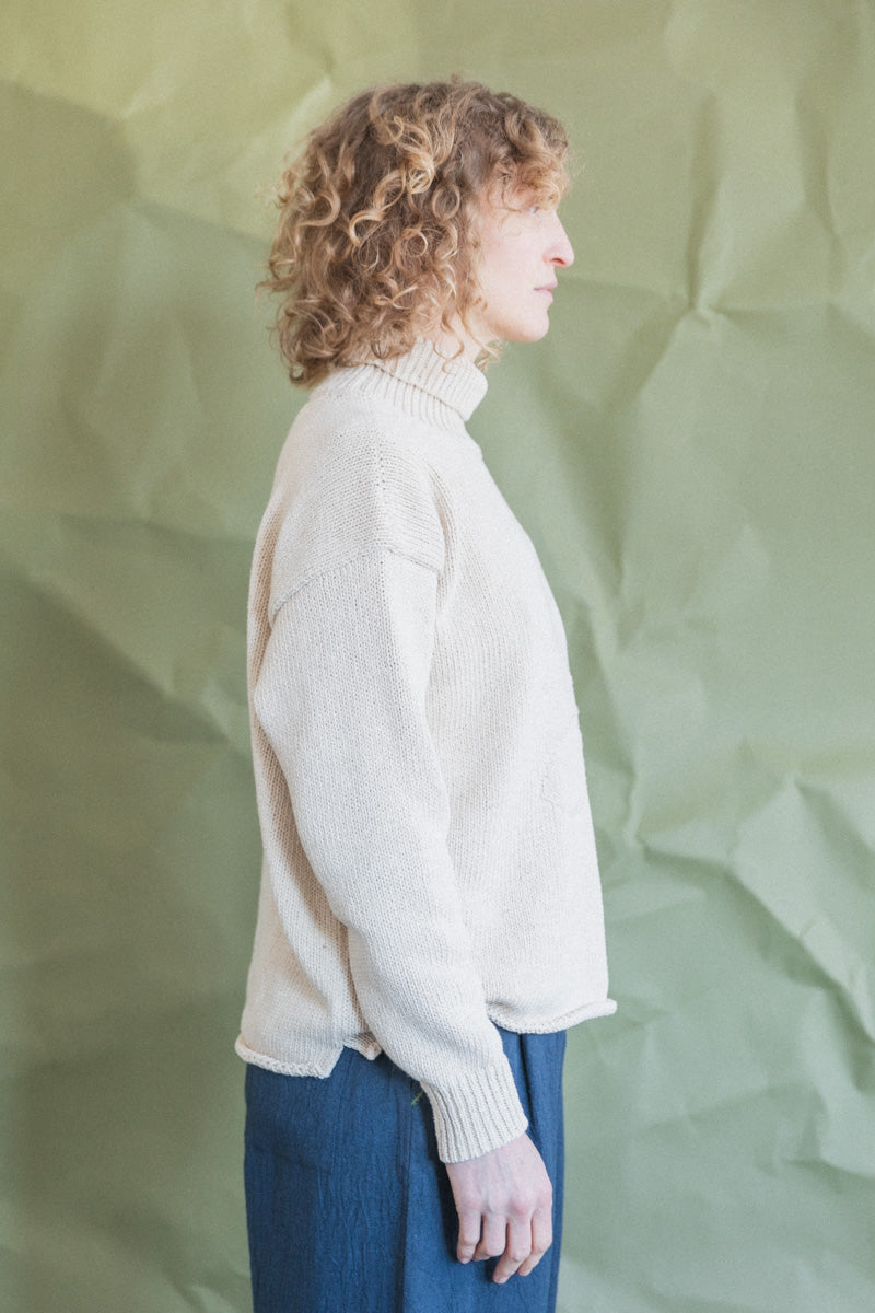 ROLL NECK FISH SWEATER IN ECRU COTTON