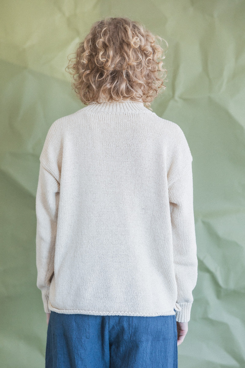 ROLL NECK FISH SWEATER IN ECRU COTTON