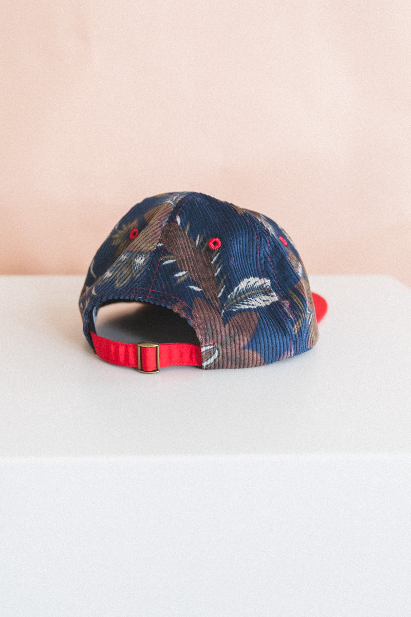 BASEBALL CAP IN FLORAL CORDUROY AND RED SILK