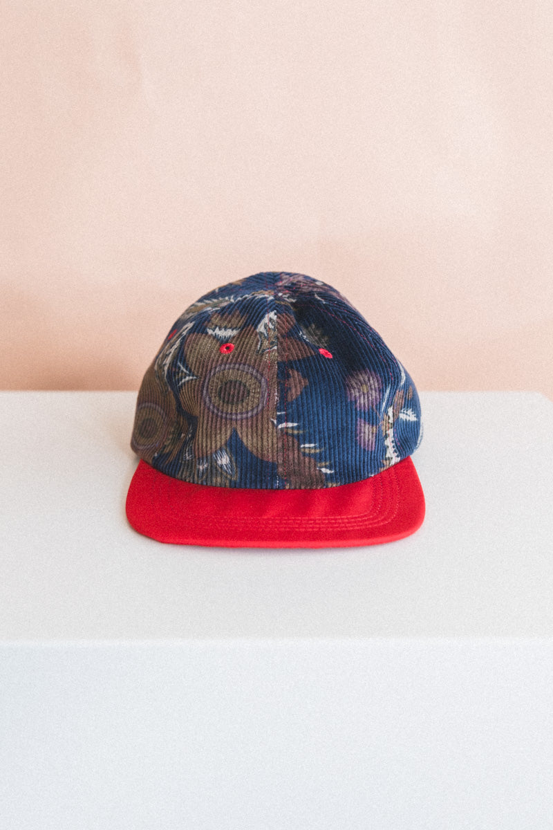 BASEBALL CAP IN FLORAL CORDUROY AND RED SILK