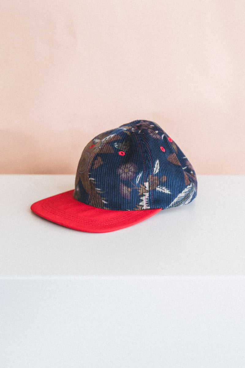 BASEBALL CAP IN FLORAL CORDUROY AND RED SILK