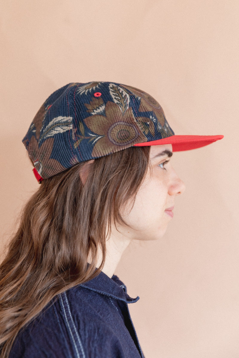 BASEBALL CAP IN FLORAL CORDUROY AND RED SILK