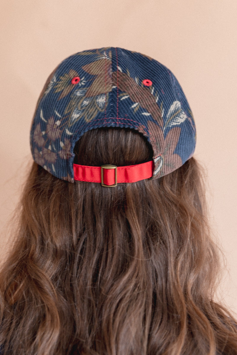 BASEBALL CAP IN FLORAL CORDUROY AND RED SILK