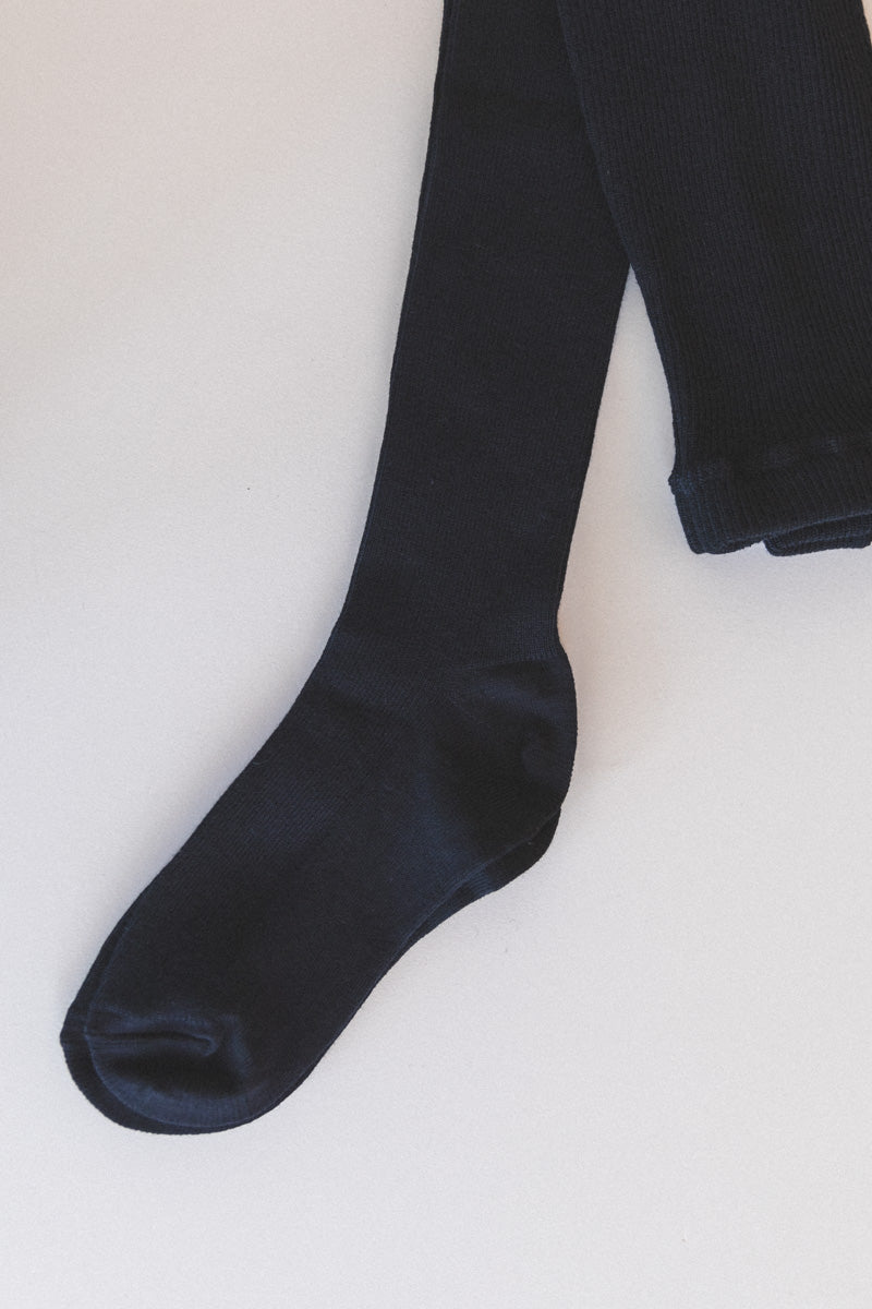 MERINO WOOL RIBBED TIGHTS IN BLACK