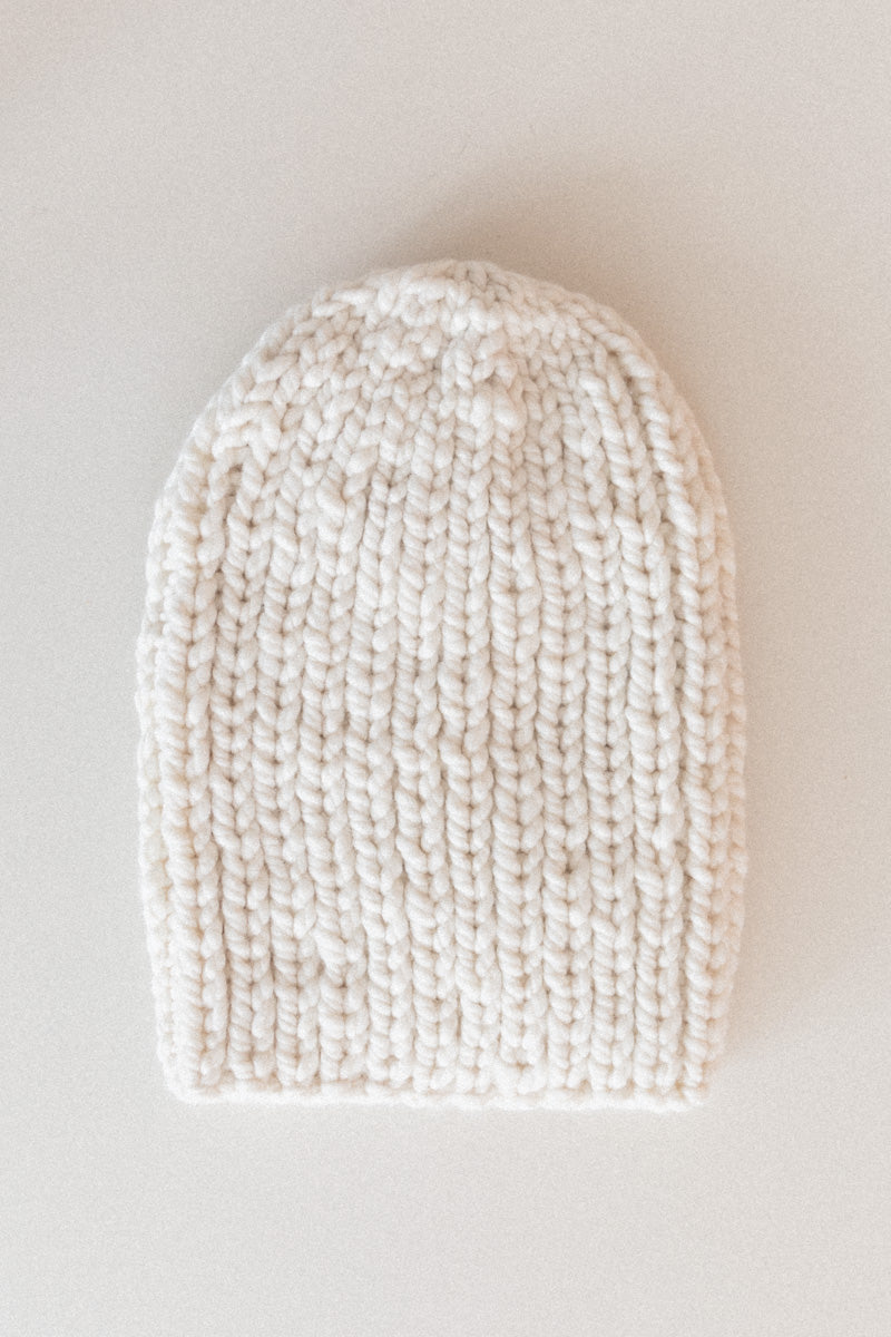 HAND SPUN AND KNITTED BEANIE HAT IN IVORY