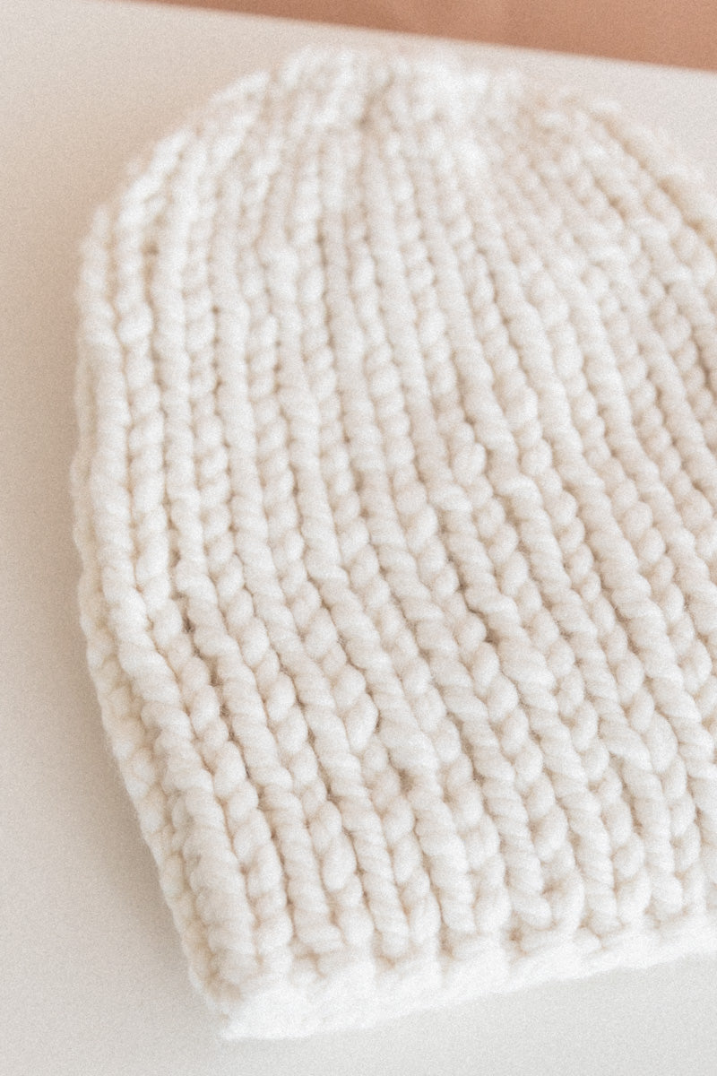 HAND SPUN AND KNITTED BEANIE HAT IN IVORY