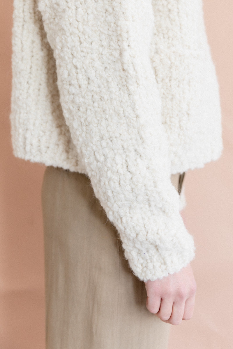 HAND KNITTED WOOL TILO SWEATER IN IVORY